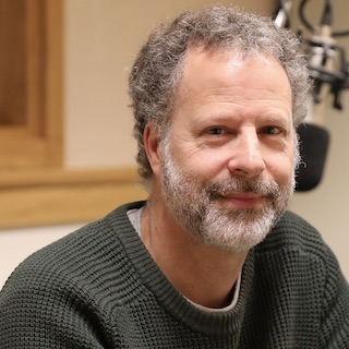 image of Eric Zolov wearing a green sweater