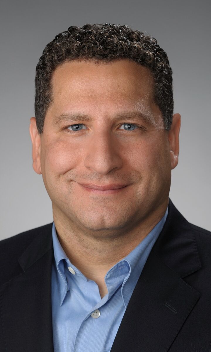image if Osamah smiling at the camera