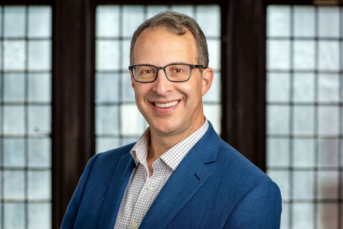 image of David Engerman, wearing glasses, in a white button down shirt and blue blazer