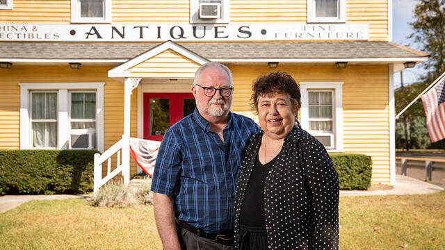 Mary DeMaio and Wayne Stewart outside their antique shop in Cape May