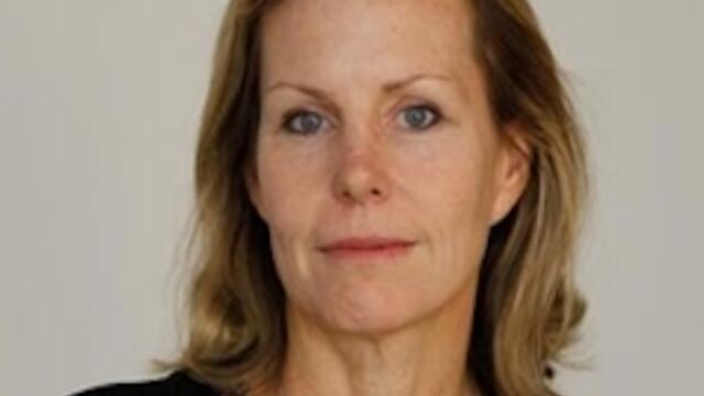 image of maryclaire wearing a black v-neck shirt
