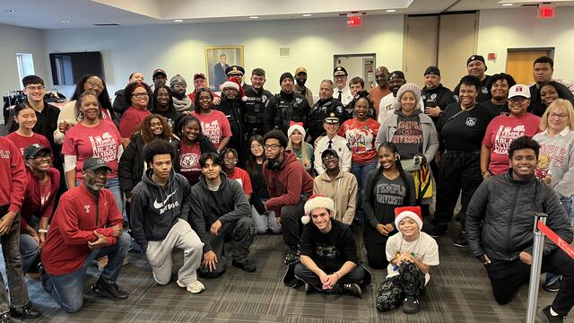 Temple Public Safety and students at annual community holiday gift event