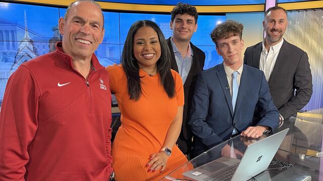 Individuals from Temple and FOX 29 on set