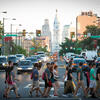 A group of student's crossing Broad Street on campus.