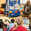 Mayor Michael Nutter reads a children s book in a Philadelphia classroom.
