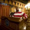 Image of Shawn Aleong behind a podium at the Pennsylvania State Capitol.