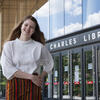 Kirtney Metz standing in front of Charles Library
