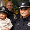 Sgts Kamari and Lauren Boone with their son Kaleb