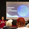 Temple University student leading a cybersecurity session for the CARE Lab. 