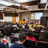 Individuals in an auditorium 